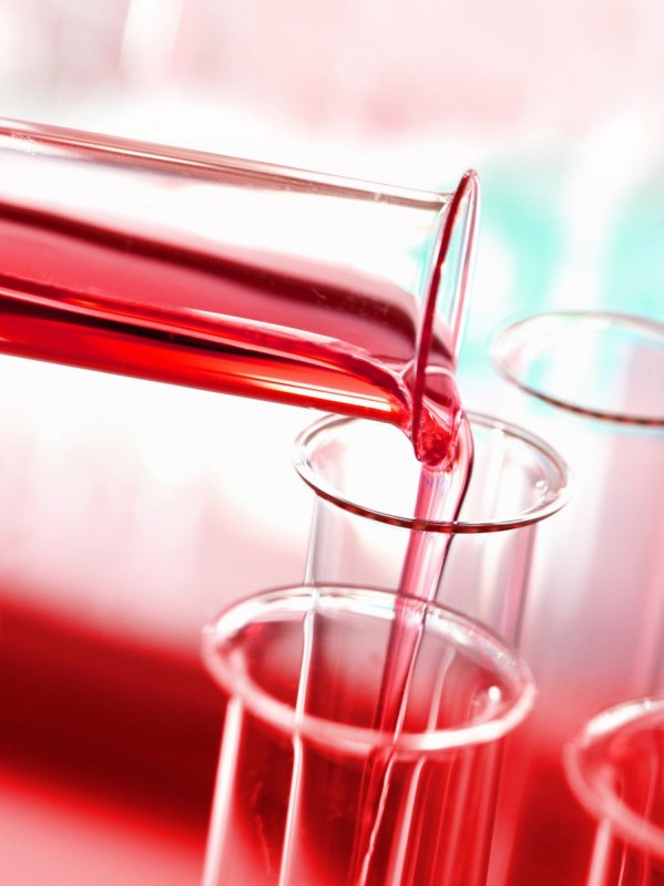 glass-test-tube-pouring-liquid-biology-research-laboratory-red-background2